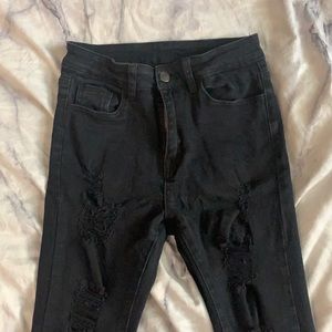 Ripped black skinny jeans